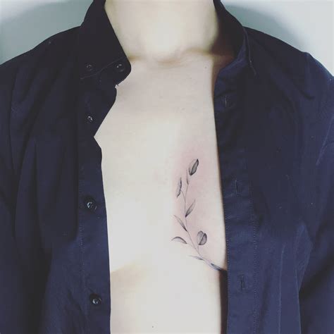 inbetween boob tattoo|Tattoo between breast